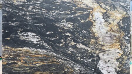 Black Forest Gold leathered granite slab with amber veining, batch 1609B-2G