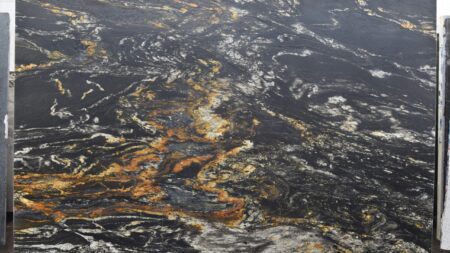Black Forest Gold leathered granite slab with amber veining, batch 1610-2G